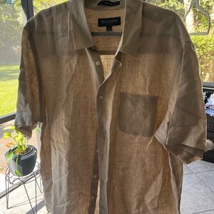 Short sleeved beige linen shirt.